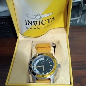 Invicta Gold and Black Timepiece